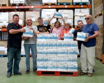 La banda de rock Luciopercas entrega 678 litros de leche al Banco de Alimentos de Teruel